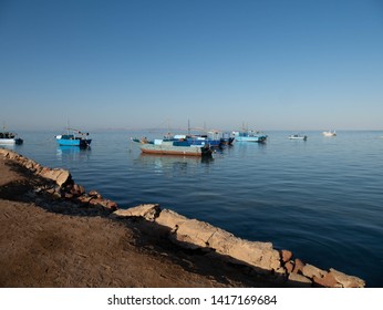 Multiple Fishing Boats In The Sea