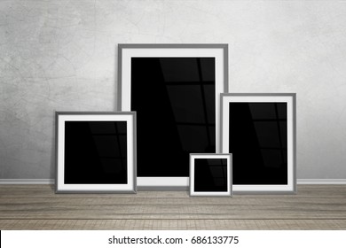 Multiple Frames Leaning On Wall. Isolated For Mockup.