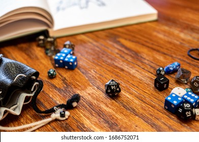 Multiple gaming dice on wooden table