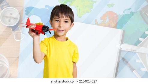 Multiple Image Of Asian Boy Playing With Toy Plane And Navigational Compass, Map And Book On Table. Portrait, Copy Space, Digital Composite, Childhood, Aviation, Patriotism, Celebration, Awareness.