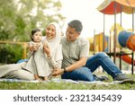 Multiple image of Malay family having fun outdoors with kid