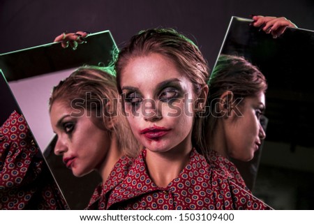Multiple mirror effect of woman looking away