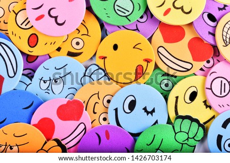 multiple Multi coloured emoji faces 