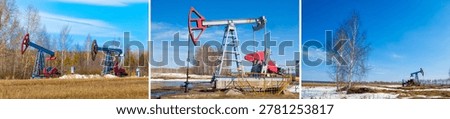 Multiple oil pump jacks distributed across a flat landscape during the transition from winter to spring. Patches of white snow contrast with the brown earth and thin trees.