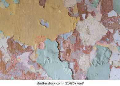 Multiple Old Paint Layers In Various Colors On Wall, Weathered Wall Texture