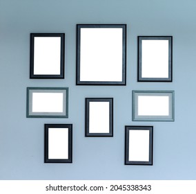 Multiple Photo Frames On Cement Wall