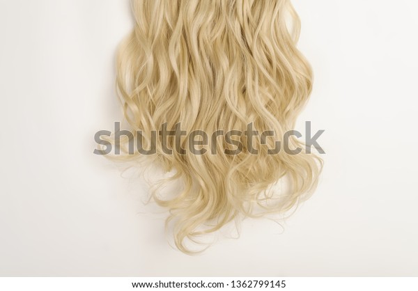 Multiple Pieces Clip Wavy Blonde Synthetic Stock Photo Edit Now