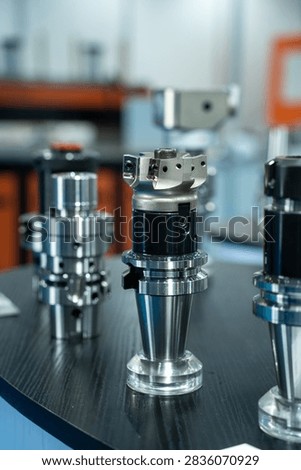 Multiple precision machining tool holders placed on a worktable