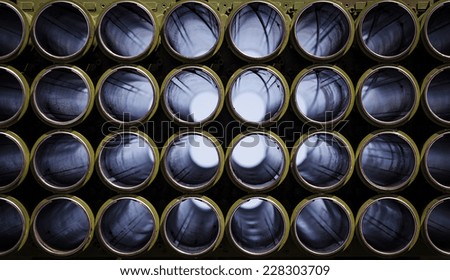 Multiple rocket launcher system, empty shafts. War concept. Shallow depth of field.