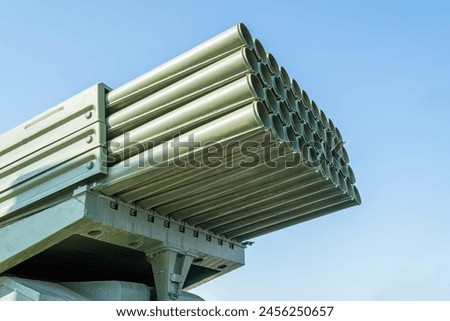 multiple rocket launcher system on a blue sky background