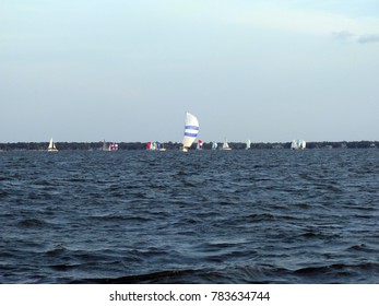 Multiple Sailboats In The Distance On Salt Water In Charleston South Carolina 