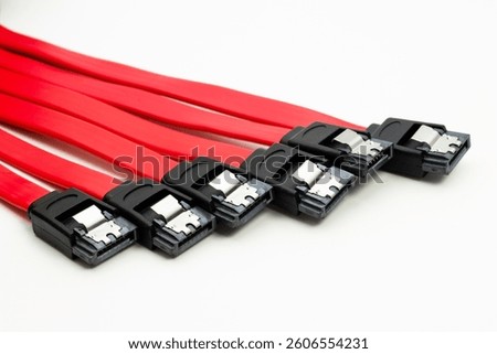Multiple sata harddisk cables arranged in a row, showcasing their connectivity for efficient data transfer and storage applications.