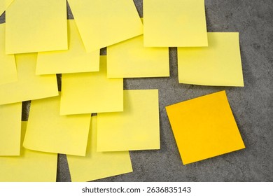 Multiple sheets sticky notes on the wall