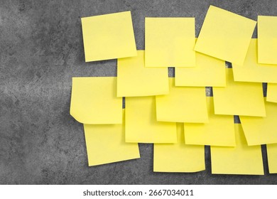 Multiple sheets sticky notes on the wall