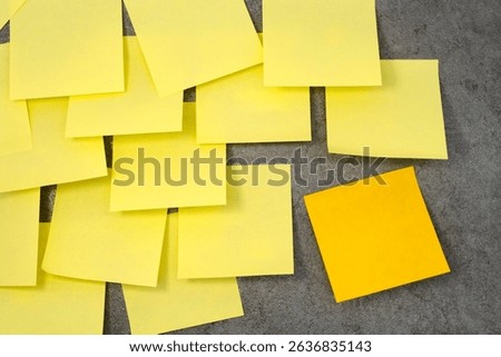 Multiple sheets sticky notes on the wall