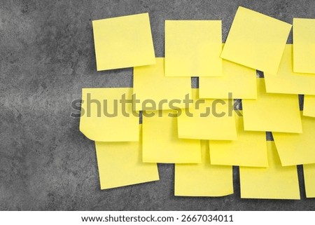 Multiple sheets sticky notes on the wall