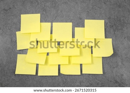 Multiple sheets sticky notes on the wall