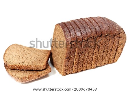 Multiple slices of dark brown bread  loaf with coriander isolated