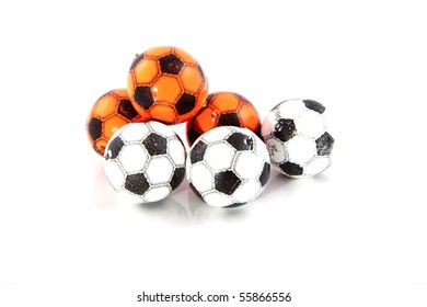 Multiple Soccer Balls On A White Background.