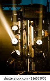 Multiple Spotlights On A Stage Lighting Rig