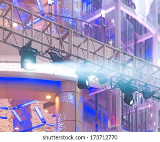 Multiple Spotlights On A Theatre Stage Lighting Rig 