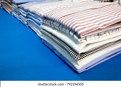 418 Pile of mens shirts Images, Stock Photos & Vectors | Shutterstock