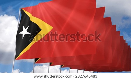 Multiple Timor Leste Flags Waving on Blue Sky Background