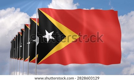 Multiple Timor Leste Flags Waving on Blue Sky Background