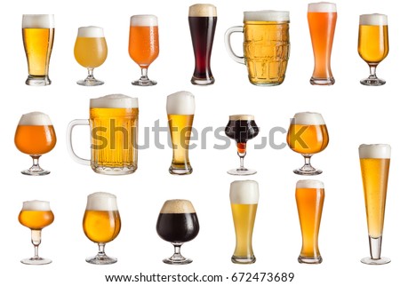 Multiple various glasses of different types of cold craft beer isolated on white background