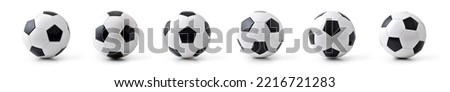 Multiple views of a classic stitched leather soccer ball with shadow and reflection isolated on white.