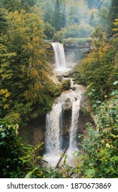 Multiple Waterfalls At Foggy Landscape