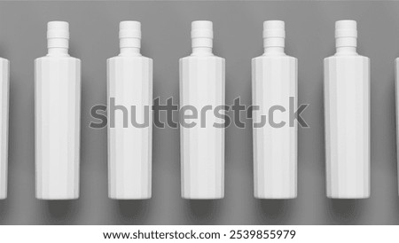 Multiple white bottles with caps aligned against a gray backdrop.