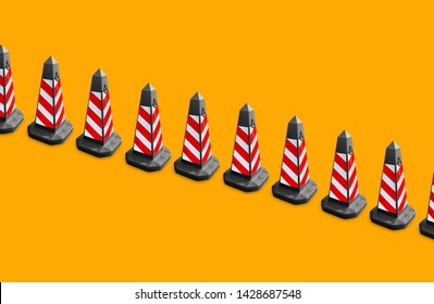 Multiple white and red safety cone forms a line pattern against bright color background. - Powered by Shutterstock