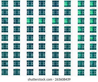 Multiple windows on a large office building