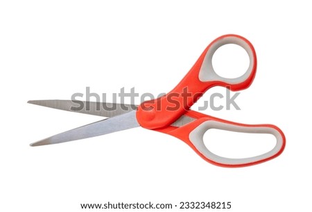 Multipurpose scissors with orange handle is isolated on white background with clipping path.