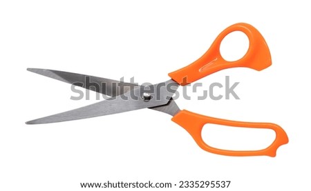 Multipurpose scissors with orange handle is isolated on white background with clipping path.