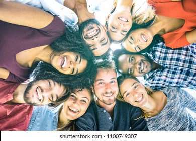 Multiracial best friends millennials taking selfie outdoors with back lighting - Happy youth friendship concept against racism with international young people having fun together - Azure filter tone