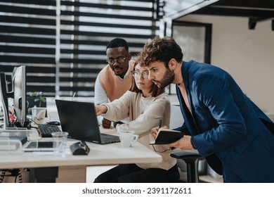 Multiracial business group works together in modern office, planning global expansion and discussing market research for profit growth and e-commerce success.