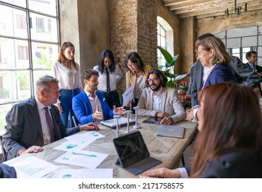 Multiracial business people discussing about energetic crisis and creating a sustainable innovation project as alternative  - Shutterstock ID 2171758575
