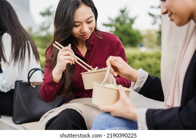 Multiracial Business People Doing Lunch Break Outdoor From Office Building - Focus On Asian Woman Face
