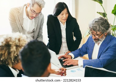 Multiracial Business People Working Inside Bank Office - Soft Focus On Asian Girl Face