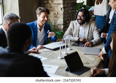 Multiracial Business People Working On Sustainable Innovation Project - Focus On Senior Woman Right Hand