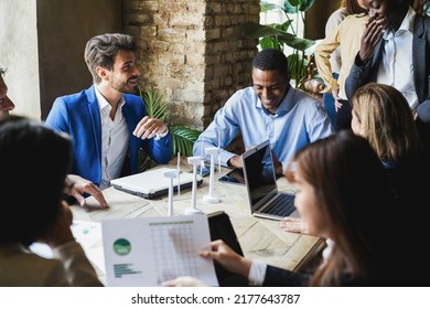 Multiracial business people working on sustainable innovation project - Green renewable energy concept - Focus on left man face - Shutterstock ID 2177643787