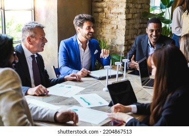 Multiracial business people working on sustainable innovation project - Focus on african man face - Powered by Shutterstock