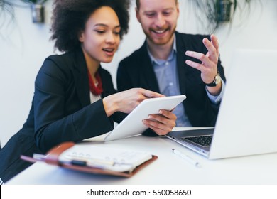 Multiracial Business People Working Together Connected With Technological Devices Like Tablet And Notebook - Teamwork, Business, Working Concept.