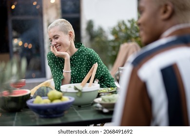 Multiracial Couple Having Dinner At Backyard Of Their Country House. Idea Of Healthy Eating And Modern Lifestyle. Black Man And European Woman Having Heart-to-heart Conversation Enjoying Time Together