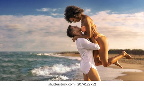 Multiracial couple on the beach - Young lovers having fun at sunset - a boyfriend picks up his woman on the beach - Powered by Shutterstock