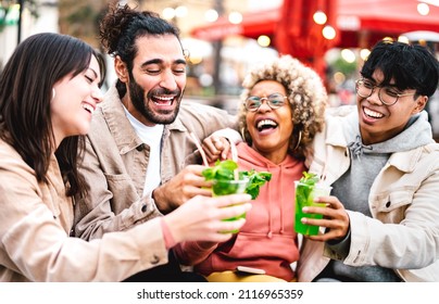 Multiracial Friends Having Genuine Fun Moment At Fancy Cocktail Cafe Patio - Hanging Out Life Style Concept With People Laughing Together On Happy Hour At Sidewalk Restaurant Bar - Bright Warm Filter