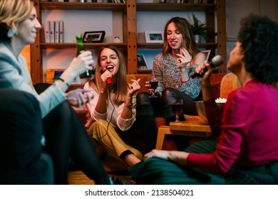 A Multiracial Friends Having Karaoke Night At Home.