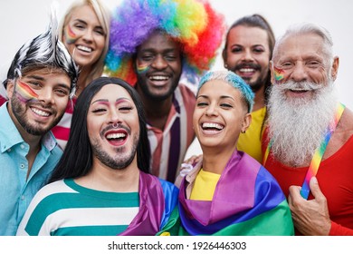 Multiracial gay people having fun at pride parade - Concept of lgbt and homosexual or transexual love